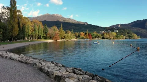 Aerial video with drone, view of the beautiful Riva del Garda town and Lake G Stock Footage 130930448