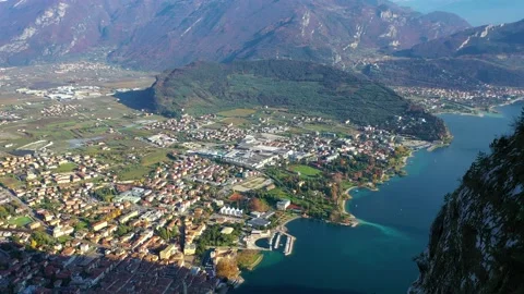 Aerial video with drone, view of the beautiful Riva del Garda town and Lake G Stock Footage 131208341