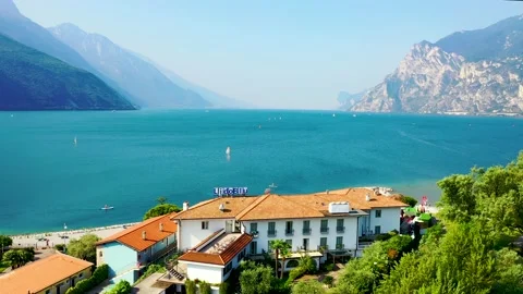 Aerial video with drone, view of the Torbole a small town on Lake Garda, Ital Stock Footage 131207959