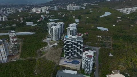 Aerial Video of Engineers Working on Luxury Seaside Buildings Stock Footage 343416403