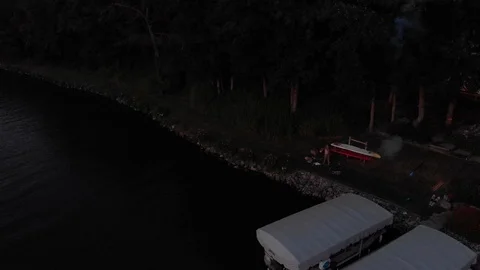 Aerial video of fireworks exploding over a lake Independence Day Stock Footage 112079199