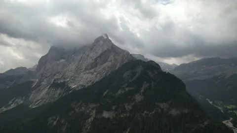 Aerial video flying forward over a forest in the Dolomites, Northern Italy Stock Footage 237295600