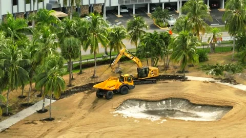Aerial video golf course development with industrial digging machines Stock Footage 169826457