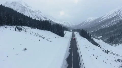 Aerial video from a height above the path crossing the mountain area Stock-Footage 143235017