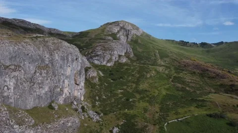 Aerial video high mountain limestone green fields Stock Footage