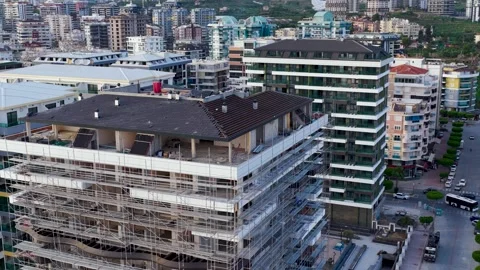 Aerial Video of High Rise Construction by Mediterranean Coast Stock Footage 343682464