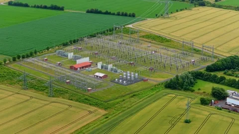 Aerial Video of High Voltage Substation in Rural Farmland Stock Footage 339920236