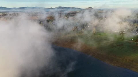 Aerial video of Lake Keepit Dam blanketed by morning fog Stock Footage 340521716