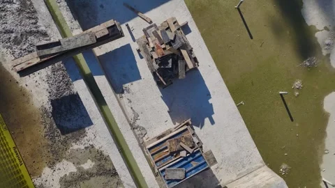 Aerial Video of a Large Construction Site With Scattered Materials, Equipment Stock-Footage 301365344