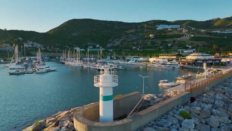 Aerial Video of Lighthouse Facing the Open Mediterranean Stock Footage 335622581