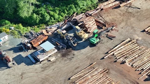Aerial video of logging yard and machinery in British Columbia, Canada Stock Footage 276968140