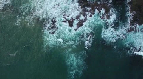Aerial video looking straight down on powerful crushing waves Stock Footage