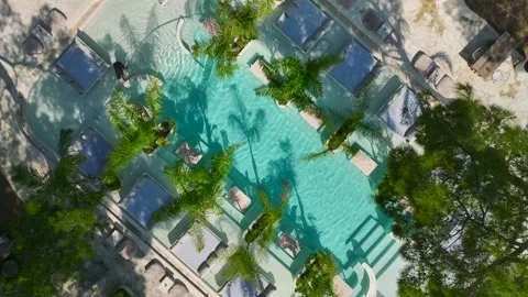 Aerial Video of Models Sunbathing at Seaside Beach Club Stock Footage 343804984