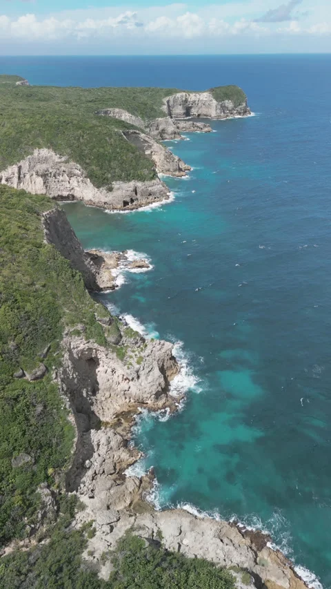 Aerial video over cliffs on the Bamari Galante coastline Stock Footage 269718327