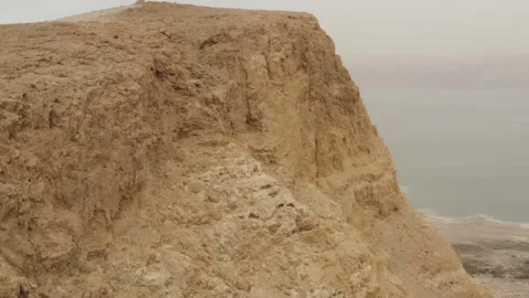 Aerial video over cliffs overlooking the Dead Sea Israel Stock Footage 289024149