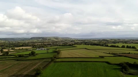 Aerial video over the green fields in Newport UK Stock Footage 280925317