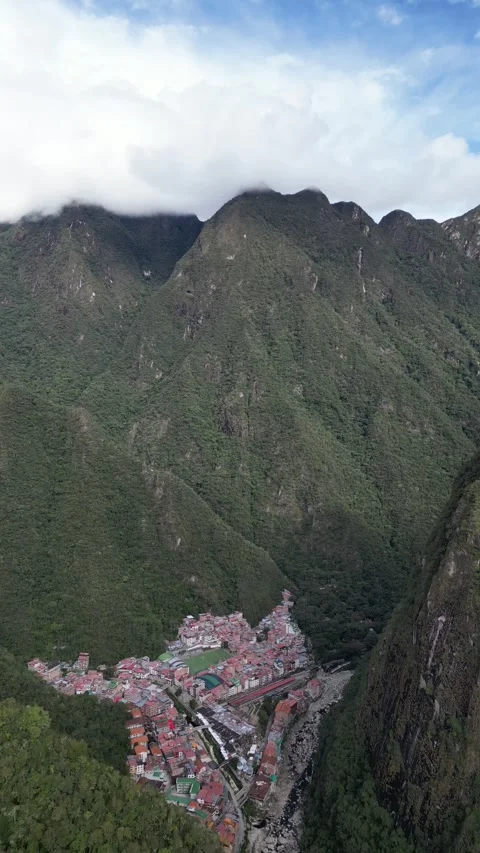 Aerial video over the town between the cities of Agua Caliente in Peru near Stock Footage 279935183