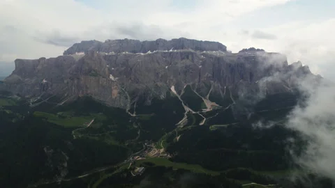 Aerial video passing through clouds over the Dolomites on a sunny summer day Stock Footage 236972867