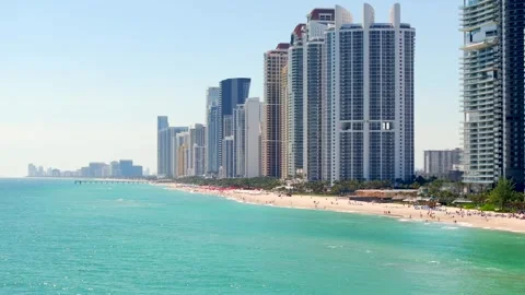 Aerial video pulling away from the shore Miami Sunny Isles 4k 2024 Stock Footage 265615906