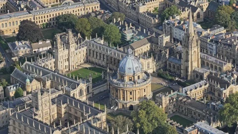 Aerial Video of Radcliffe Square surrounded by Oxford's historic colleges. Video stock 121805923
