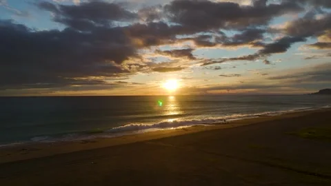 Aerial Video of Romantic Evening Sky Painted in Pastel Colors Above Calm Blue Stock Footage 342814322