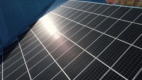 Aerial video of rooftop based solar panels. Sunny day in autumn. Stock Footage 220282323