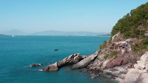 Aerial Video of Seaside Cliffs and Ocean Waves Under Sky Stock Footage 319609723