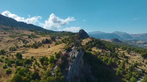 Aerial Video of Sharp Rock Formation in Rural Setting Stock Footage 334112345