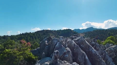 Aerial Video of Sharp Rocky Hill in Village Area Stock Footage 334113129