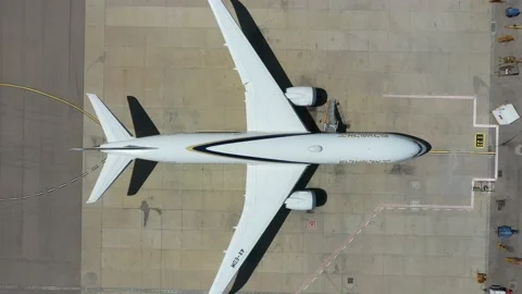 Aerial video shoot going down, above an El Al passenger plane Stock Footage 236613906
