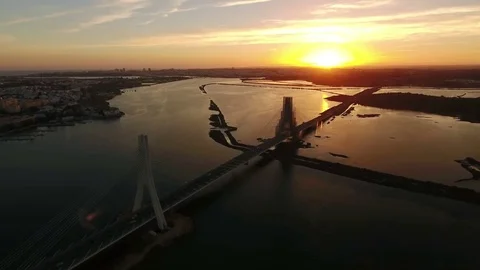 Aerial. Video shooting flight over bridge and Arade river. Portimao Stock Footage