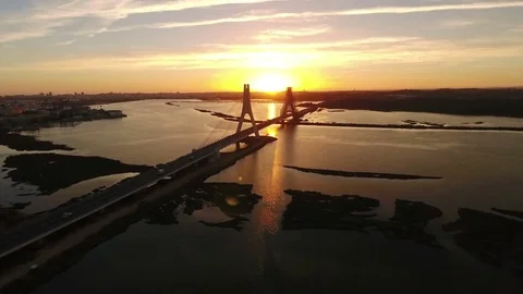 Aerial. Video shooting flight over bridge and Arade river. Portimao Stock Footage