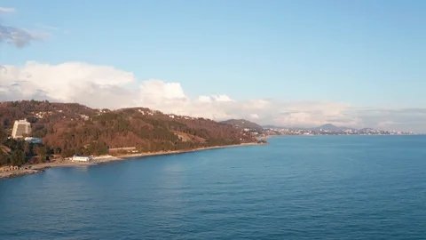 Aerial video shooting. Sunset over the sea and the coast of Sochi. Vidéo 106976594
