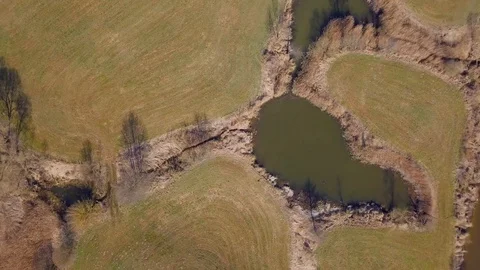 Aerial video with small pond on meadows. Stock Footage 128287924