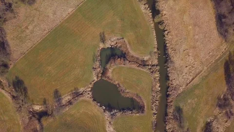 Aerial video with small pond on meadows. Vídeo Stock 128288080
