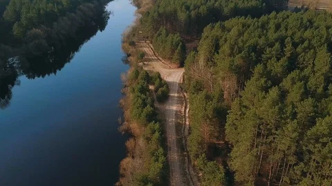 Aerial video of spring nature: a forest and a river. Top view on picturesque Stock Footage 90133426