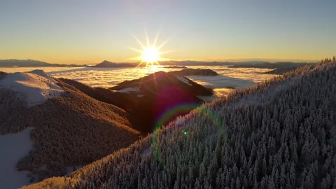 Aerial Video of Sun Rising over Winter Mountain Inversion Video stock 327594792