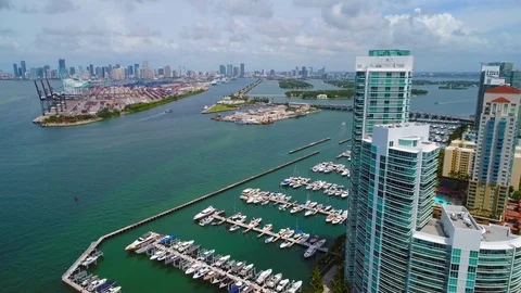 Aerial video tour Miami Beach bay Marina highrise condominiums 4k 60p Stock Footage