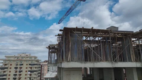 Aerial Video of Tower Crane Assisting in Concrete Build Stock Footage 343321025