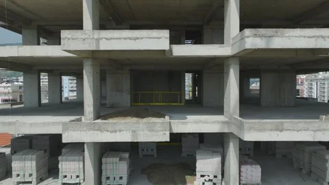 Aerial Video of Tower Crane Lifting Materials on Construction Site Stock Footage 343264656