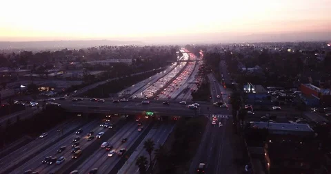 Aerial Video Track Shot View of Los Angeles Freeway at Sunset in 4K UHD Stock Footage