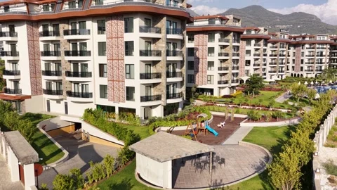 Aerial Video of upscale residential complex with pool, garden and modern Stock-Footage 341314271
