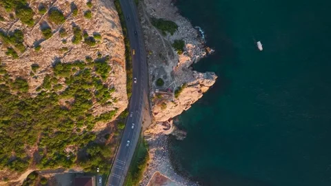 Aerial Video of White Lighthouse by the Harbor Entrance Stock Footage 335622541