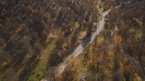 Aerial Video of Winding Road Through Autumn Mountains Stock Footage 337640465