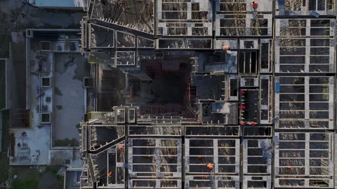 Aerial Video Workers prepare a new construction floor with metal and bricks Stock Footage 343902709