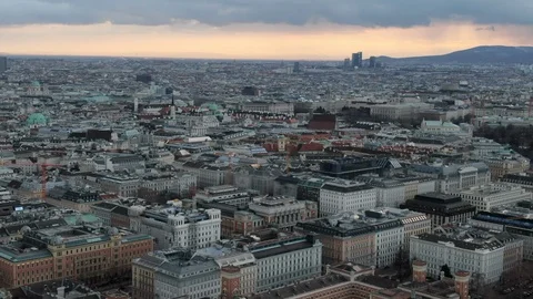Aerial of Vienna Cityscape with Mountains Behind, in Austria Stock Footage