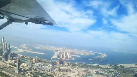 Aerial view 2 of Dubai from plane, Palm Jumeirah and Dubai Marina skyline - V Stock Footage 101287719