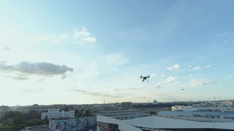 Aerial view 3 drones flying over the city Video stock 101742455