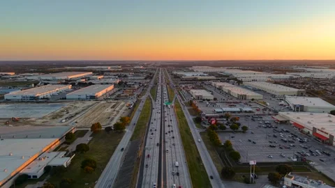 Aerial view of 35W freeway at Fort Worth, Texas Industrial complex with hea.. Stock Footage 323567620