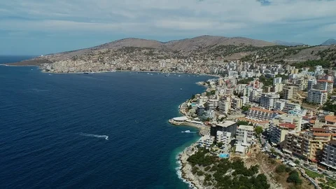 Aerial view in 360 degrees spin of the tropical costal city of Saranda, Albania Vidéo 126612988